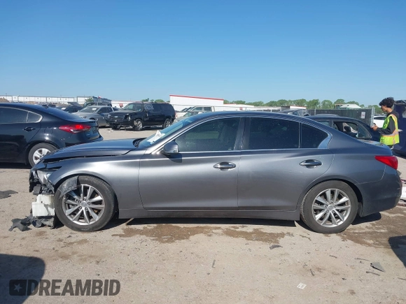 2014 Infiniti Q50 Hybrid Premium with VIN JN1AV7AP4EM691014, listed as a IAAI auction lot 41984130 with 114,230 mi miles and . Bid and sale history available at DreamBid. Image 14.