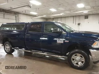 2015 Ram 2500 Tradesman z VIN 3C6TR5HTXFG605539, wystawiony jako IAAI lot #41833380 z przebiegiem 103 921 mil mil oraz . Historia ofert i sprzedaży dostępna na DreamBid. Obrazek 13.