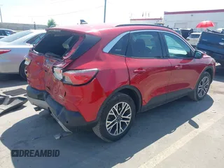 2020 Ford Escape SEL z VIN 1FMCU9H96LUB93983, wystawiony jako IAAI lot #42493510 z przebiegiem 56 675 mil mil oraz . Historia ofert i sprzedaży dostępna na DreamBid. Obrazek 4.