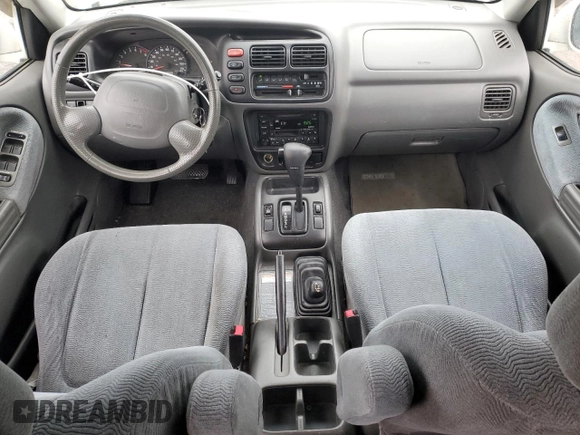 2002 Suzuki XL7 Standard z VIN JS3TX92V224107876, wystawiony jako Copart lot #78257934 z przebiegiem 142 177 mil mil oraz Czysty tytuł • Clean title. Historia ofert i sprzedaży dostępna na DreamBid. Obrazek 8.