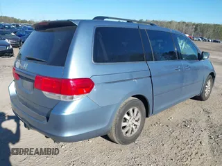 2010 Honda Odyssey EX-L with VIN 5FNRL3H77AB096732, listed as a IAAI auction lot 41831744 with 22,523 mi miles and . Bid and sale history available at DreamBid. Image 4.