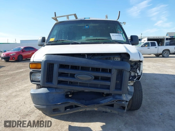 2014 Ford Econoline Cargo Commercial with VIN 1FTNE1EW8EDB20428, listed as a IAAI auction lot 41335946 with 201,988 mi miles and . Bid and sale history available at DreamBid. Image 12.