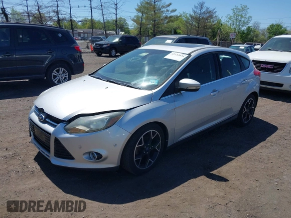 2012 Ford Focus Titanium with VIN 1FAHP3N28CL149792, listed as a IAAI auction lot 42133034 with 125,562 mi miles and . Bid and sale history available at carsss.com. Image 2.