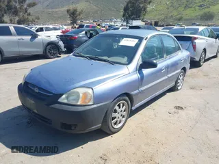 2005 Kia Rio with VIN KNADC125356385613, listed as a IAAI auction lot 41841381 with 91,273 mi miles. Bid and sale history available at carsss.com. Image 2.