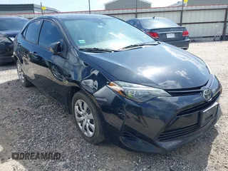 2018 Toyota Corolla L with VIN 5YFBURHE3JP759296, listed as a IAAI auction lot 42511254 with 201,506 mi miles and . Bid and sale history available at DreamBid. Image 1.