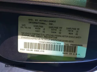 2002 Mazda 626 LX with VIN 1YVGF22D925287959, listed as a IAAI auction lot 41610932 with 122,333 mi miles. Bid and sale history available at carsss.com. Image 9.