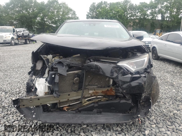 2017 Toyota RAV4 LE z VIN 2T3BFREV4HW663532, wystawiony jako Copart lot #57798035 z przebiegiem 100 922 mil mil oraz Szkoda całkowita • Salvage title. Historia ofert i sprzedaży dostępna na DreamBid. Obrazek 5.