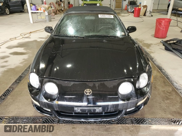 1997 Toyota Celica GT z VIN JT5FG02T3V0041206, wystawiony jako Copart lot #54601725 z przebiegiem 198 685 mil mil oraz Szkody całkowita. Historia ofert i sprzedaży dostępna na DreamBid. Obrazek 5.