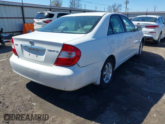 2003 Toyota Camry LE with VIN 4T1BE32K63U249910, listed as a IAAI auction lot 41719507 with 125,168 mi miles and . Bid and sale history available at DreamBid. Image 4.