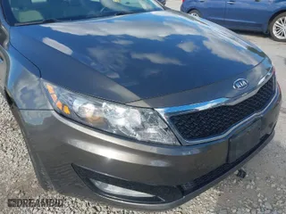 2012 Kia Optima LX with VIN 5XXGM4A72CG083861, listed as a IAAI auction lot 41909434 with 124,526 mi miles. Bid and sale history available at carsss.com. Image 6.