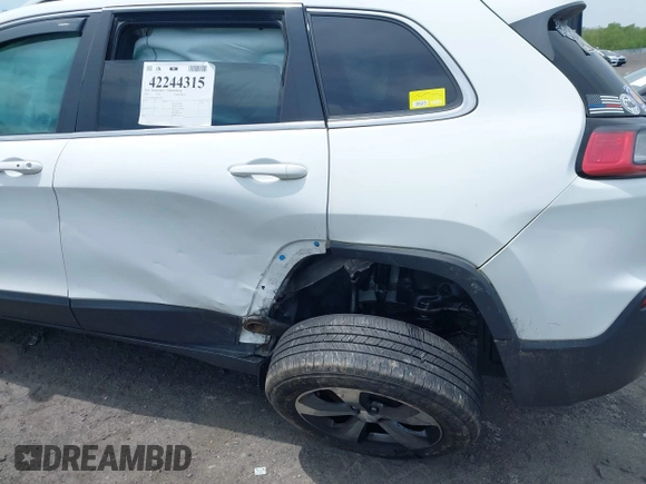 2019 Jeep Cherokee Limited z VIN 1C4PJMDX2KD239071, wystawiony jako IAAI lot #42244315 z przebiegiem 99 135 mil mil oraz . Historia ofert i sprzedaży dostępna na DreamBid. Obrazek 6.