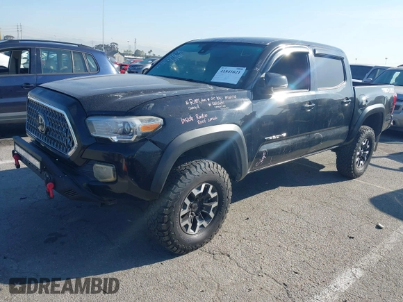 2019 Toyota Tacoma SR z VIN 5TFCZ5AN9KX199814, wystawiony jako IAAI lot #41841821 z przebiegiem 69 276 mil mil oraz . Historia ofert i sprzedaży dostępna na DreamBid. Obrazek 18.