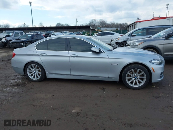2014 BMW 5 Series 535i xDrive with VIN WBA5B3C52ED537121, listed as a IAAI auction lot 41678763 with 126,979 mi miles and . Bid and sale history available at carsss.com. Image 13.