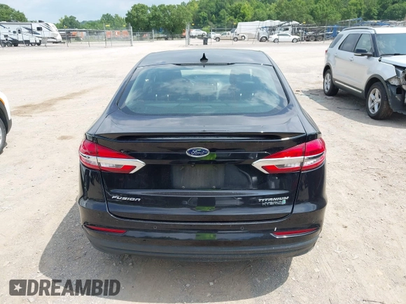 2019 Ford Fusion Titanium z VIN 3FA6P0RU0KR260239, wystawiony jako IAAI lot #42436643 z przebiegiem 114 631 mil mil oraz . Historia ofert i sprzedaży dostępna na DreamBid. Obrazek 16.