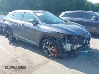 2017 Lexus RX 350 with VIN 2T2BZMCA4HC074707, listed as a IAAI auction lot 42439938 with 127,240 mi miles and . Bid and sale history available at DreamBid. Image 1.