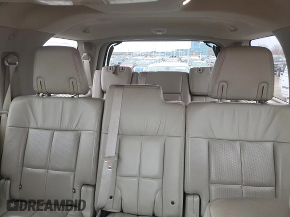 2012 Lincoln Navigator z VIN 5LMJJ2J53CEL01546, wystawiony jako Copart lot #51806275 z przebiegiem 212 022 mil mil oraz Szkoda całkowita • Salvage title. Historia ofert i sprzedaży dostępna na DreamBid. Obrazek 10.