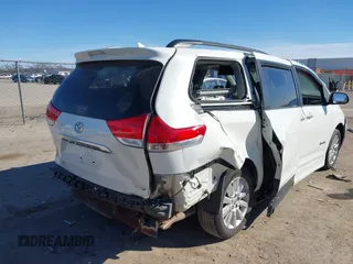 2011 Toyota Sienna XLE AAS with VIN 5TDYK3DCXBS126143, listed as a IAAI auction lot 41663238 with 154,238 mi miles. Bid and sale history available at carsss.com. Image 4.