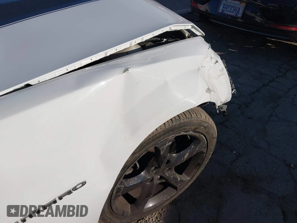 2014 Chevrolet Camaro LT z VIN 2G1FC1E39E9321549, wystawiony jako IAAI lot #41582840 z przebiegiem 129 495 mil mil oraz . Historia ofert i sprzedaży dostępna na DreamBid. Obrazek 20.