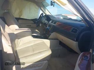 2007 Chevrolet Suburban LS with VIN 1GNFC16007J203853, listed as a IAAI auction lot 39454050 with 246,521 mi miles and . Bid and sale history available at DreamBid. Image 5.