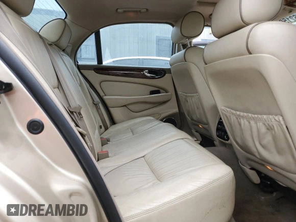 2004 Jaguar XJ with VIN SAJEA74C84SG03857, listed as a Copart auction lot 62156875 with 92,649 mi miles and Salvage title. Bid and sale history available at DreamBid. Image 10.