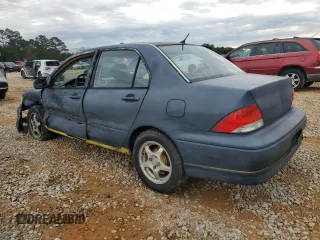 2003 Mitsubishi Lancer OZ-Rally with VIN JA3AJ86E33U079131, listed as a Copart auction lot 88582825 with 213,593 mi miles and Salvage Title. Bid and sale history available at carsss.com. Image 2.