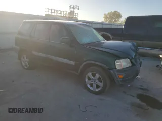 2000 Honda CR-V EX with VIN JHLRD1863YC017768, listed as a Copart auction lot 76383504 with 223,753 mi miles and Salvage Title. Bid and sale history available at carsss.com. Image 4.