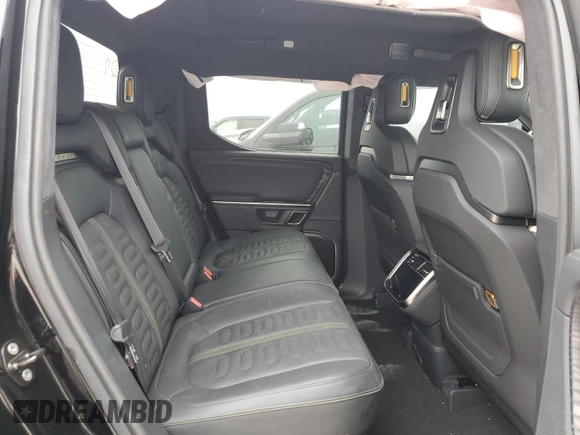 2022 Rivian R1T Adventure z VIN 7FCTGAAA5NN015734, wystawiony jako Copart lot #44019715 z przebiegiem 27 542 mil mil oraz Szkody całkowita. Historia ofert i sprzedaży dostępna na DreamBid. Obrazek 11.