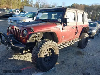 2010 Jeep Wrangler Unlimited Sport with VIN 1J4BA3H17AL107173, listed as a IAAI auction lot 41361595 with 245,624 mi miles. Bid and sale history available at carsss.com. Image 2.