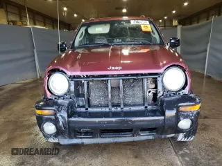 2002 Jeep Liberty Limited with VIN 1J4GL58K62W358660, listed as a Copart auction lot 61719985 with 195,873 mi miles and Salvage title. Bid and sale history available at DreamBid. Image 5.