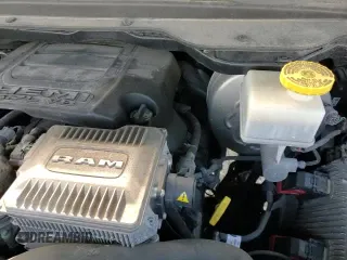 2021 Ram 1500 Rebel z VIN 1C6SRFLT0MN797874, wystawiony jako Copart lot #85874135 z przebiegiem 67 416 mil mil oraz Czysty tytuł • Clean title. Historia ofert i sprzedaży dostępna na DreamBid. Obrazek 13.