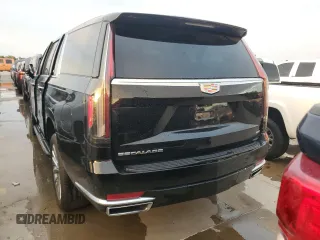 2023 Cadillac Escalade z VIN 1GYS3KKL3PR360009, wystawiony jako Copart lot #77258524 z przebiegiem 12 874 mil mil oraz Szkoda całkowita • Salvage title. Historia ofert i sprzedaży dostępna na DreamBid. Obrazek 6.