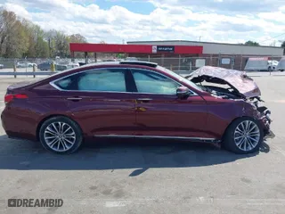 2015 Hyundai Genesis 3.8L with VIN KMHGN4JE9FU034033, listed as a IAAI auction lot 41900965 with 104,673 mi miles. Bid and sale history available at carsss.com. Image 13.