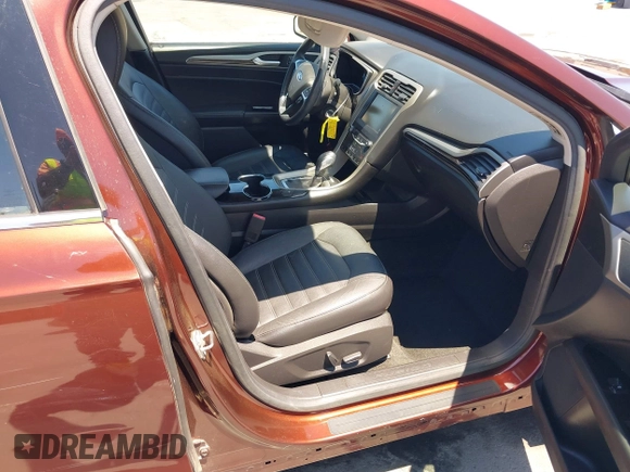 2015 Ford Fusion SE Hybrid с VIN 3FA6P0LU2FR310783, выставлен на аукционе IAAI как лот 42617746 с пробегом 47 264 миль миль и . История ставок и продаж доступна на DreamBid. Изображение 5.