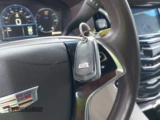 2015 Cadillac Escalade Luxury z VIN 1GYS3MKJ9FR725818, wystawiony jako IAAI lot #41596731 z przebiegiem 224 246 mil mil oraz . Historia ofert i sprzedaży dostępna na DreamBid. Obrazek 11.