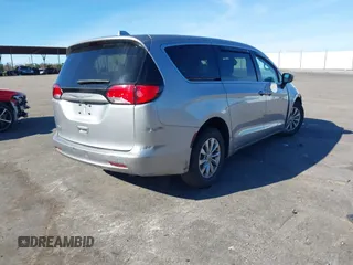 2017 Chrysler Pacifica Touring with VIN 2C4RC1DG1HR519085, listed as a IAAI auction lot 41053786 with 269,605 mi miles and . Bid and sale history available at DreamBid. Image 4.