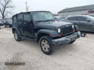 2007 Jeep Wrangler Unlimited X with VIN 1J4GA39177L153387, listed as a IAAI auction lot 42021211 with 207,965 mi miles and . Bid and sale history available at DreamBid. Image 1.