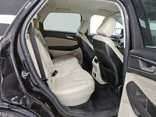 2021 Ford Edge Titanium с VIN 2FMPK4K94MBA27083, выставлен на аукционе Copart как лот 62149285 с пробегом 128 325 миль миль и Чистый • Clean title. История ставок и продаж доступна на DreamBid. Изображение 10.