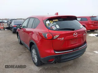2014 Mazda CX-5 Touring with VIN JM3KE4CYXE0425274, listed as a IAAI auction lot 41510678 with 78,431 mi miles. Bid and sale history available at carsss.com. Image 3.