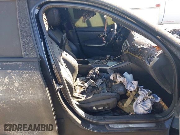 2019 BMW 3 Series 330i with VIN WBA5R1C58KFH10594, listed as a IAAI auction lot 41501625 with Not Provided miles and . Bid and sale history available at DreamBid. Image 5.