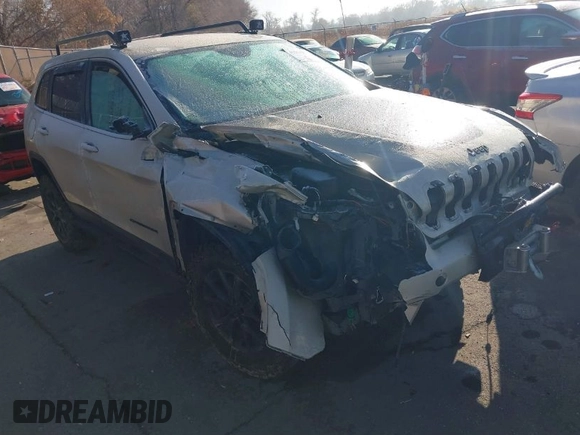 2015 Jeep Cherokee Latitude with VIN 1C4PJMCS4FW578401, listed as a IAAI auction lot 41014082 with 127,465 mi miles. Bid and sale history available at carsss.com. Image 1.