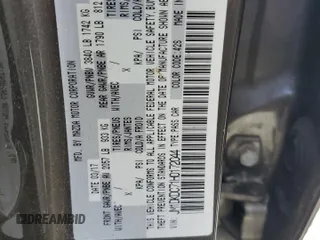 2017 Mazda CX-3 Touring z VIN JM1DKDC71H0172044, wystawiony jako Copart lot #56465125 z przebiegiem 119 374 mil mil oraz Szkoda całkowita • Salvage title. Historia ofert i sprzedaży dostępna na DreamBid. Obrazek 13.