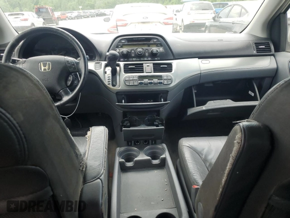 2006 Honda Odyssey Touring z VIN 5FNRL38886B000011, wystawiony jako Copart lot #57399225 z przebiegiem 256 217 mil mil oraz Szkoda całkowita • Salvage title. Historia ofert i sprzedaży dostępna na DreamBid. Obrazek 8.