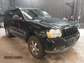 2008 Jeep Grand Cherokee Laredo with VIN 1J8GR48K18C148596, listed as a IAAI auction lot 42007251 with 227,561 mi miles. Bid and sale history available at carsss.com. Image 1.