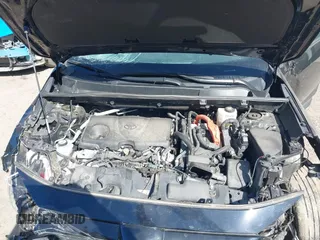 2022 Toyota RAV4 Hybrid XLE z VIN 4T3RWRFV0NU054821, wystawiony jako IAAI lot #42144555 z przebiegiem 29 485 mil mil oraz . Historia ofert i sprzedaży dostępna na DreamBid. Obrazek 10.