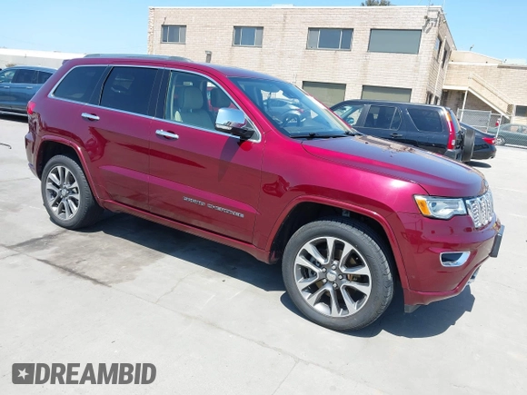 2017 Jeep Grand Cherokee Overland with VIN 1C4RJFCTXHC676236, listed as a IAAI auction lot 42164645 with 94,658 mi miles and . Bid and sale history available at DreamBid. Image 1.