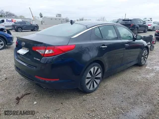 2013 Kia Optima SX with VIN 5XXGR4A61DG184092, listed as a IAAI auction lot 41923574 with 150,092 mi miles. Bid and sale history available at carsss.com. Image 4.