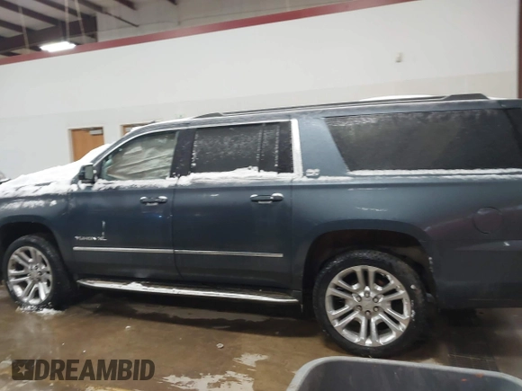 2019 GMC Yukon XL SLT with VIN 1GKS2GKC5KR137005, listed as a IAAI auction lot 41435370 with 125,453 mi miles and . Bid and sale history available at carsss.com. Image 13.