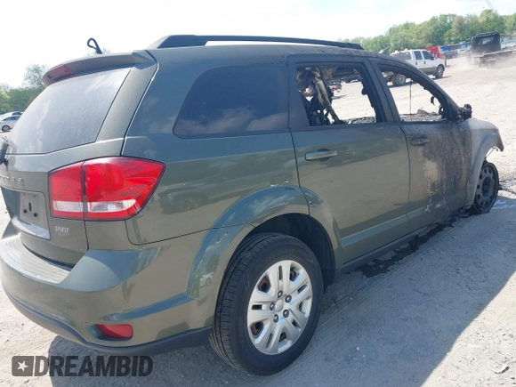 2019 Dodge Journey SE with VIN 3C4PDCBB4KT732026, listed as a IAAI auction lot 42177975 with Not provided miles and . Bid and sale history available at DreamBid. Image 4.