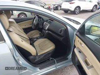 2009 Mazda 6 i Touring with VIN 1YVHP82AX95M19535, listed as a IAAI auction lot 41987285 with 129,111 mi miles and . Bid and sale history available at carsss.com. Image 5.