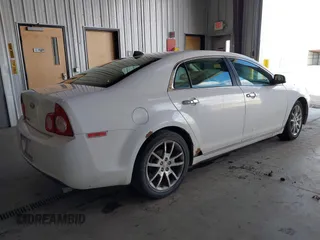 2012 Chevrolet Malibu LTZ with VIN 1G1ZG5E79CF111257, listed as a IAAI auction lot 42066475 with 163,282 mi miles and . Bid and sale history available at DreamBid. Image 4.